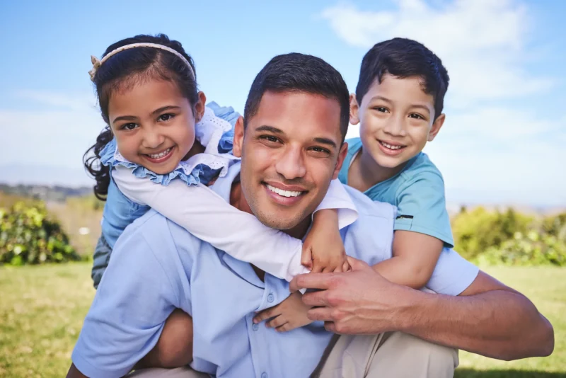 Father spending time outdoors with his children